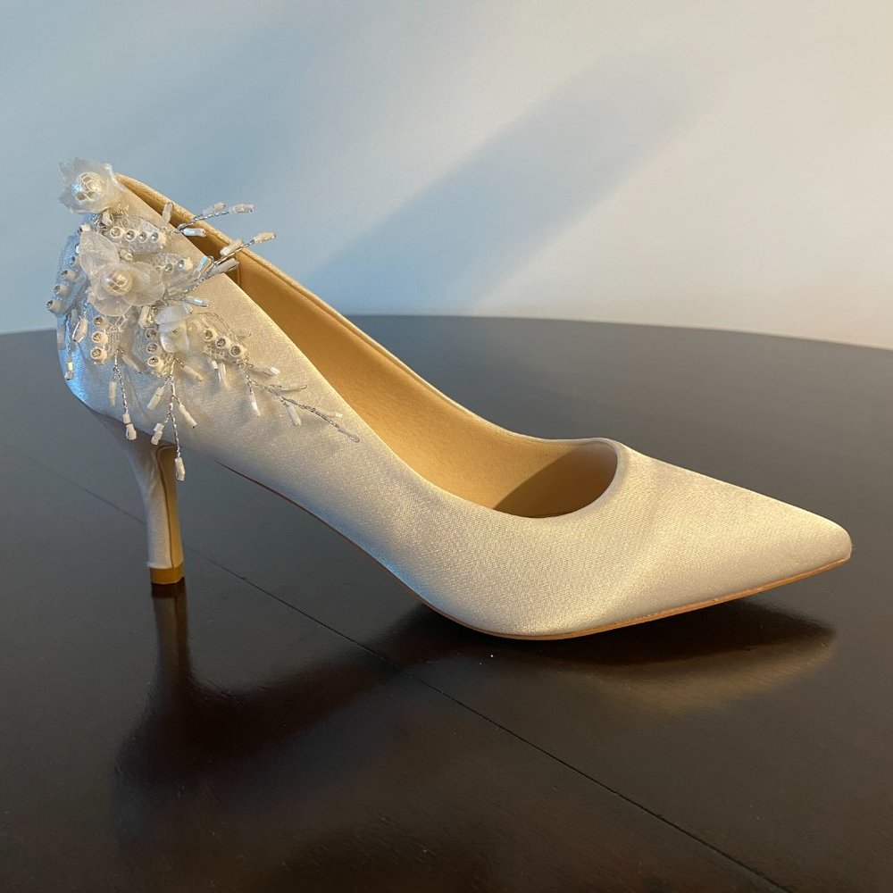 Elegant, handmade, never worn low heel
